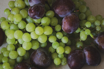 Sticker - delicious fresh summer plums and green grapes	
