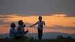 © MEDIAIMAG - Grandparents blowing soap bubbles while grandchildren play to catch them at sunset in the nature