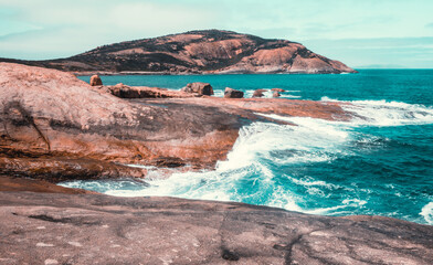 Wall Mural - Deserted beach, rocky bay with waves and blue and turquoise water, Western Australia