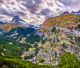 Canvas Print - View of Matterhorn mountain with Zermatt from a panoramic trail. Switzerland