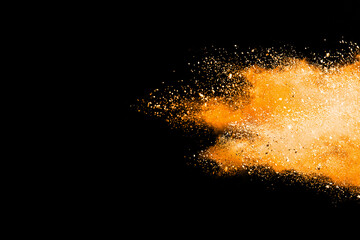 Wall Mural - explosion of colored powder isolated on black background.