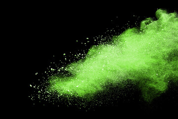 Wall Mural - explosion of colored powder isolated on black background.