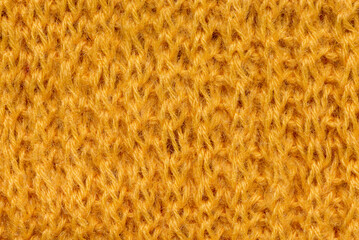 Hand knitted yellow wool knitted texture