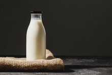 Closed Blank Glass Bottle Of Milk, Front View