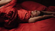© stockbusters - Graceful woman posing red silk bed. Bare female person looking camera bedroom.