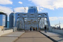 Nashville, Tennessee, United States. Fan Of Nashville Predators Walk On The John Seigenthaler Pedestrian Bridge Before Hockey Match.