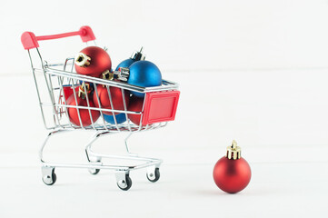 Wall Mural - Christmas toys in the shopping basket