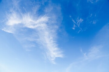 Wall Mural - White cirrocumulus clouds in the blue sky. Beautiful sky background