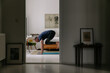 © VISUALSPECTRUM/Stocksy - Man Doing Jumping Work Out in Beautiful Bedroom