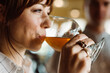 © CWP, LLC/Stocksy - Woman drinking craft beer from a goblet