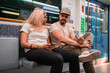 © Gillian Vann/Stocksy - unhappy couple on subway