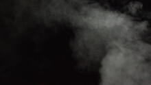 Soft Fog In Slow Motion On Dark Backdrop. Realistic Atmospheric Gray Smoke On Black Background. White Fume Slowly Floating Rises Up. Abstract Haze Cloud. Animation Mist Effect. Smoke Stream Effect 4K