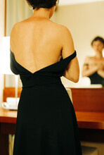 Woman In The Black Dress From Behind