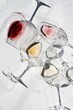 © Viktor Solomin/Stocksy - wine glasses with different types of wine