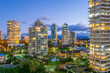 © Gary Chapman/Austockphoto - Hi rise apartment buildings at twilight on the Gold Coast