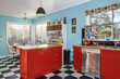© Nicole Hastings/Austockphoto - Red and teal retro kitchen interior