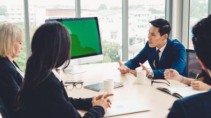 Poster - business people in the conference room with green screen chroma key tv or computer on the office tab