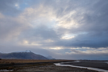 Canvas Print - clouds above icelandic landscape at blue hour