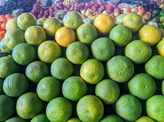 closeup view of green sweet lime (mosambi)in a local market