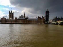 Dark Grey Sky Clouds Storm Coming Or Sun Comes Out Winter Day In London At Westminster Abbey Bridge River Thames Big Ben