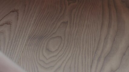 Wall Mural - Slow motion closeup man hand touches ash wood floor