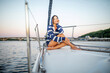 © Maygutyak - Beautiful girl resting on a yacht at sunset