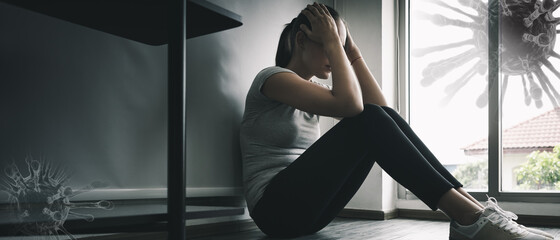 Woman with a mental health illness sitting sad near the window with headache and stress home quarantine fear of the coronavirus or COVID-19 outbreak. Double exposure 3D virus background copy space.