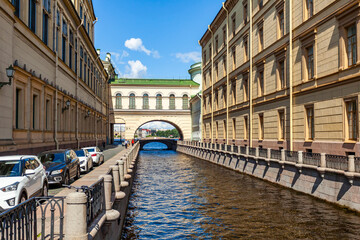 Wall Mural - St. Petersburg, Russia, July 13, 2020. View of the Zimnyaya Kanavka canal connecting the Moika and Neva rivers, the Hermitage bridge and its picturesque embankments.
