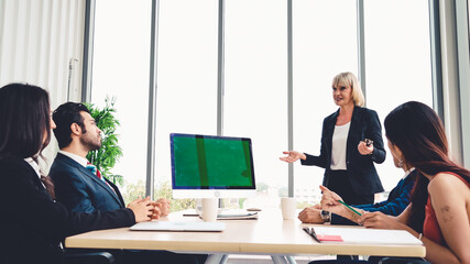 Poster - business people in the conference room with green screen chroma key tv or computer on the office tab