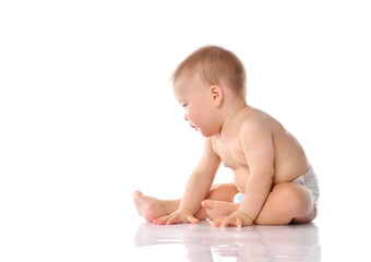 Wall Mural - Cute little baby in diaper clapping hand on floor