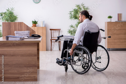 Cuadros en Lienzo Young disabled employee suffering at workplace