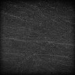 © peekeedee - Dark grey black slate background or texture.