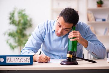 Wall Mural - Young man in courthouse in divorcing concept