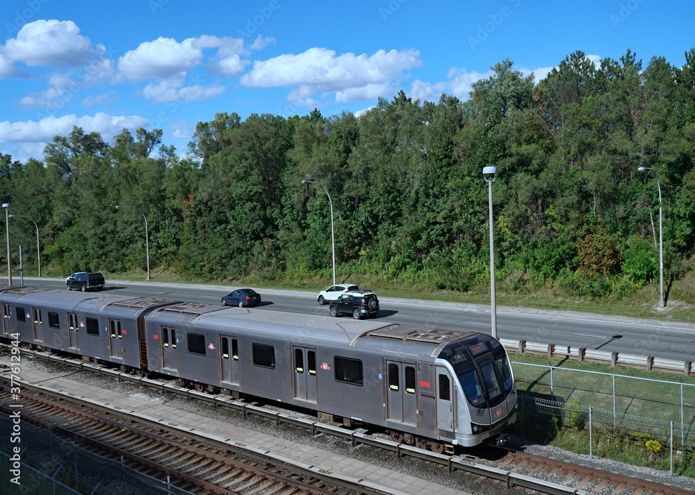 One of Toronto's commuter trains runs partly underground and partly ...