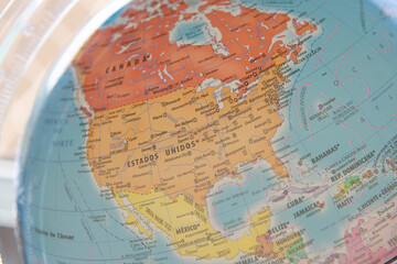 close up of terrestrial globe with focus on north america. focus on canada, united states of america