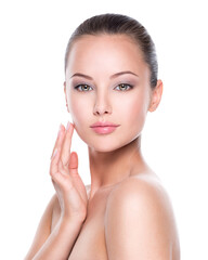 Wall Mural - portrait of young beautiful woman with hands at face