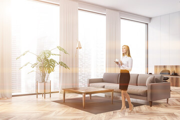 Woman in white and wooden living room