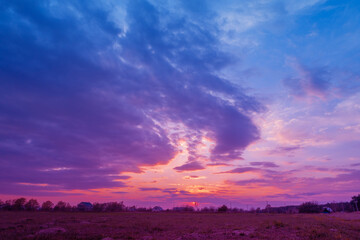 Wall Mural - colorful cloudy sky at sunset. sunset over the countryside. sky texture. abstract nature background