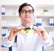 © Elnur - Safety doctor advising about wearing protective goggles