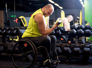 Disabled man training in the gym of rehabilitation center