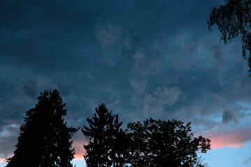 Wall Mural - dark gray storm clouds after the rain