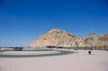 Wall Mural - Al Ain Jabal Hafeet Mountain Landscape Views of Al Ain with Blue Sky Background