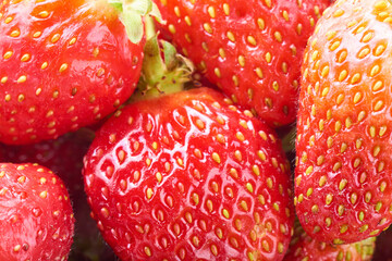 Natural background of red strawberries. Food texture.