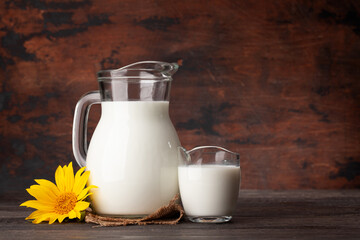 Wall Mural - Milk in glass jug