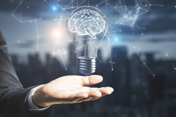Poster - Hand holding glowing lamp with brain hologram