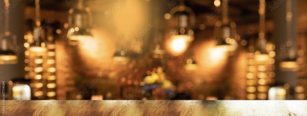 golden lamp with blur bar or pub party at night orange light city interior banner background - obrazy, fototapety, plakaty 
