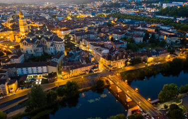 Wall Mural - Aerial view of Perigueux city illuminated at night, Perigord Blanc, Dordogne..