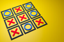 3D Illustration Of A Tic-tac-toe Game With No Winning Side In Cartoon Style On A Yellow Background. Game And Draw Illustration.