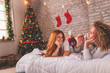 © Impact Photography - Couple enjoying their time together on Christmas morning