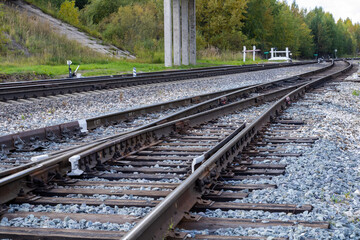 Wall Mural - Railroad. Railroad tracks made of metal and concrete.